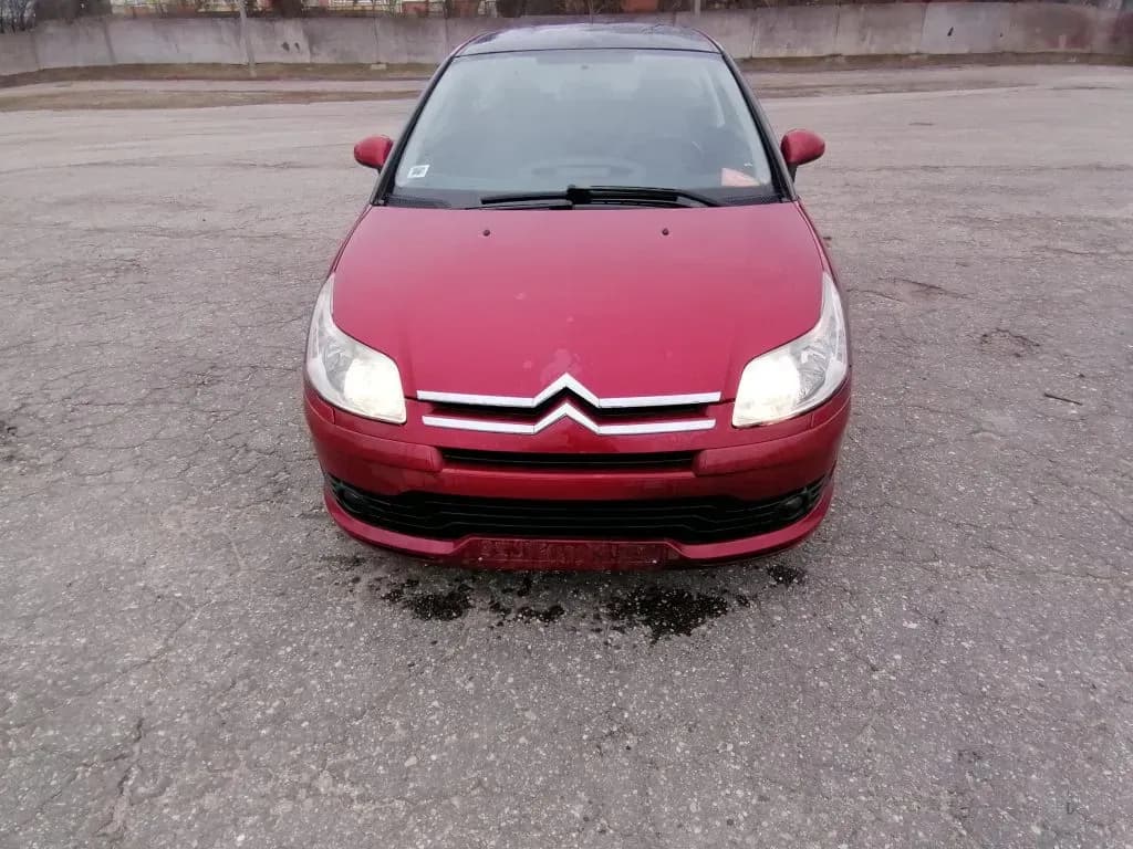 Disassembled car photo 1