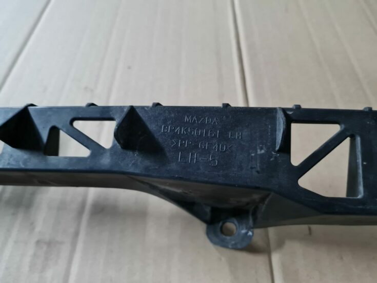 Priekšēja luktura kronšteins priekš MAZDA 3 2007